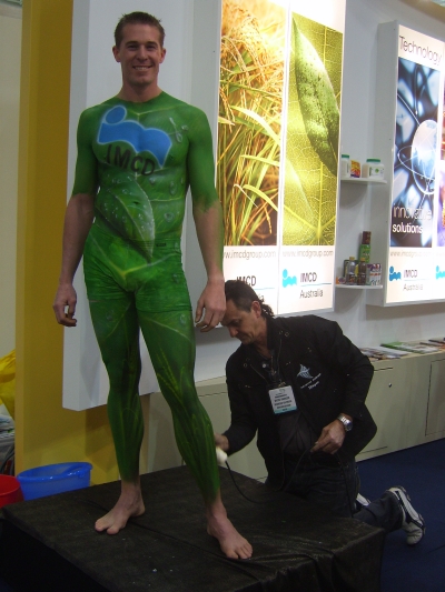 Airbrush body painting at trade stand