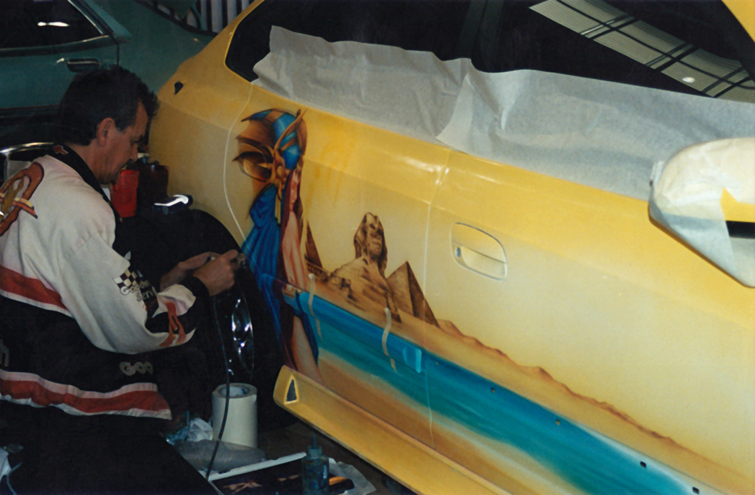 Wayne airbrushing Jo's car 2002
