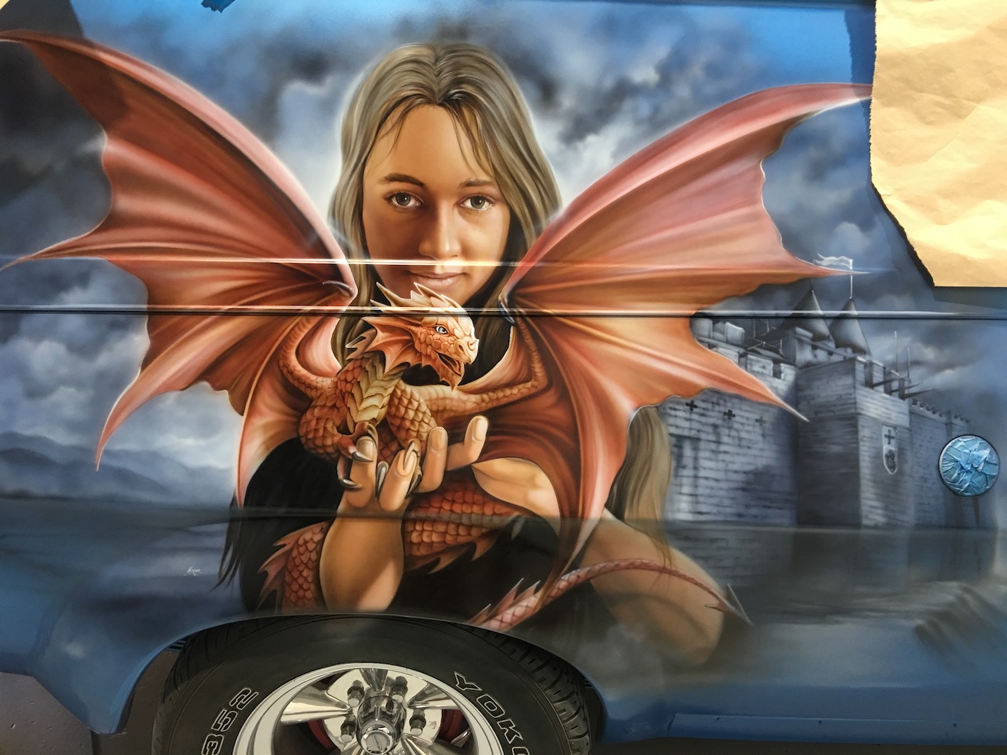Panel van blue dragon with daughter
